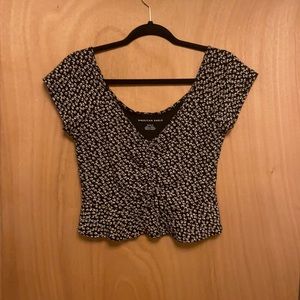 Black shirt sleeve top with flowers